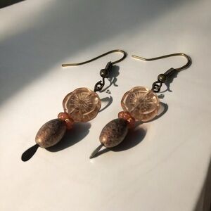 Intricate Gold and Brown Earrings with Teardrop Design